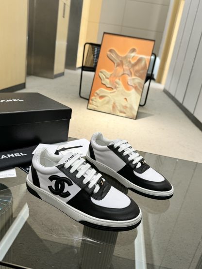 Chanel classic design black and white casual sneakers - Image 4