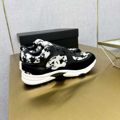Chanel classic fashion black and white casual sneakers - Image 8