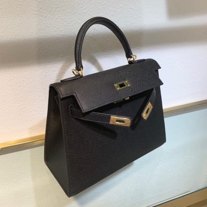 A black Kelly handbag from Hermès Size: 20613cm - Image 8