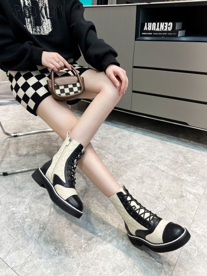 Chanel's latest boots from the Paris catwalk in beige and black - Image 7