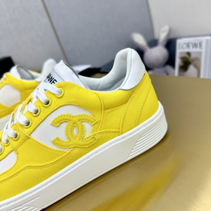 Chanel classic yellow and white mix and match fashion casual sneakers - Image 8