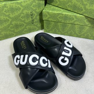 Gucci cross-over slippers