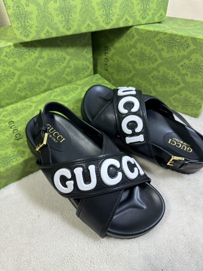 Gucci cross-over slide sandals