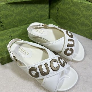 Gucci cross-over slide sandals