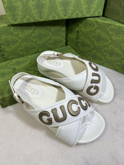 Gucci cross-over slide sandals