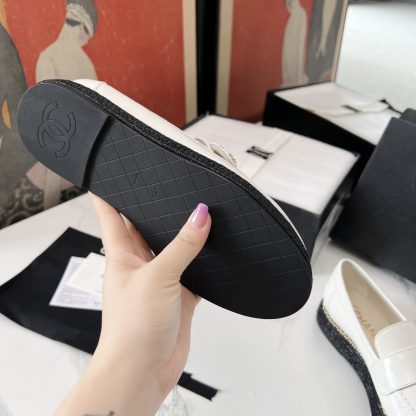 Chanel's new four seasons retro style small round toe white loafers - Image 9