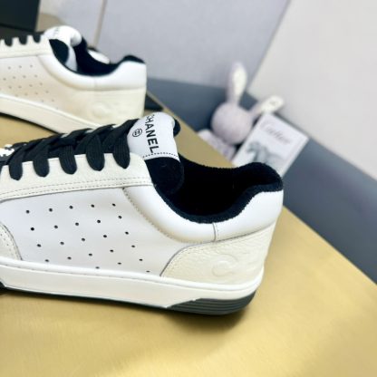 Chanel classic white and black mix and match fashion casual sneakers - Image 9