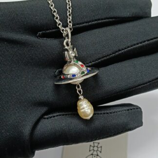 Vivienne Westwood earrings colored diamonds Baroque pearl chain