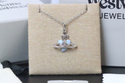 Vivienne Westwood blue enamel heart Saturn necklace