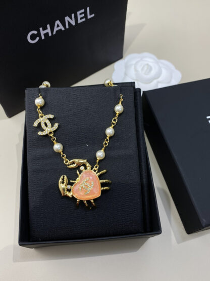 Chanel glass pink gold rhinestone double c crab necklace