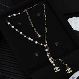Chanel leather with black gold pearl necklace