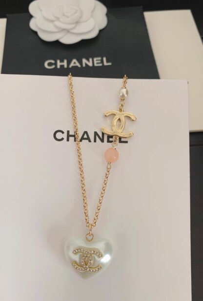 Chanel white heart necklace
