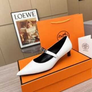Hermès white loafers are a must-have for holiday wear