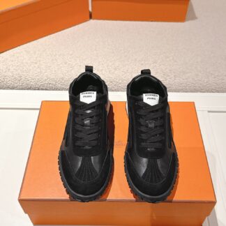 Hermès black goatskin contrasting sneakers, 2cm thick sole