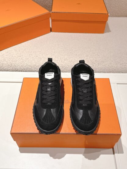 Hermès black goatskin contrasting sneakers, 2cm thick sole