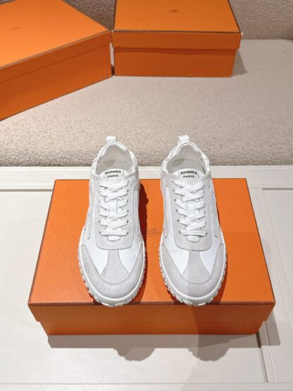 Hermès white and grey goatskin contrasting sneakers, 2cm thick sole