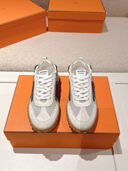 Hermès apricot black goatskin contrasting sneakers, 2cm thick sole
