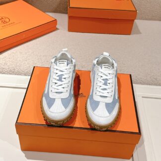 Hermès white and blue goatskin contrasting sneakers, 2cm thick sole