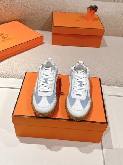 Hermès white and blue goatskin contrasting sneakers, 2cm thick sole