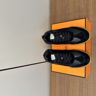 Hermès black and brown goatskin contrasting sneakers, 2cm thick sole