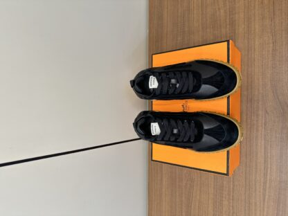 Hermès black and brown goatskin contrasting sneakers, 2cm thick sole
