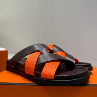 Hermès black and orange woven slippers