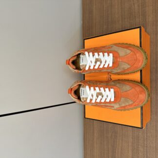Hermès brown and orange goatskin contrasting sneakers, 2cm thick sole