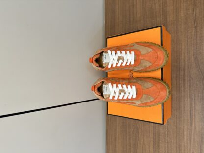 Hermès brown and orange goatskin contrasting sneakers, 2cm thick sole