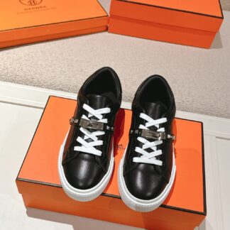 Hermes couple black and white kelly shoe buckle classic flat casual shoes