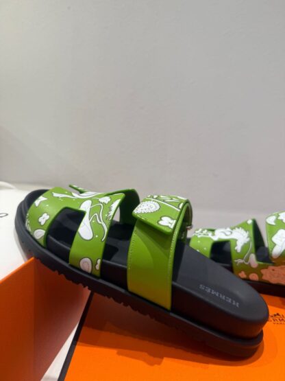 Hermès couple's green and white woven sandals