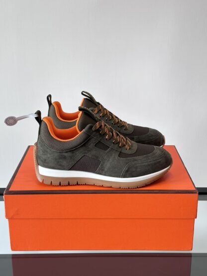 Hermès lightweight and versatile dark green sneakers