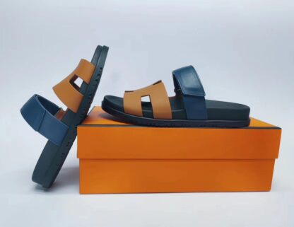 Hermès couple brown and blue woven slippers