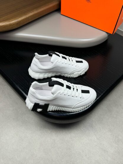 Hermes high-end noble white and black color matching thick-soled casual shoes