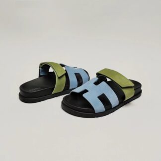 Hermès couple's blue-green woven slippers