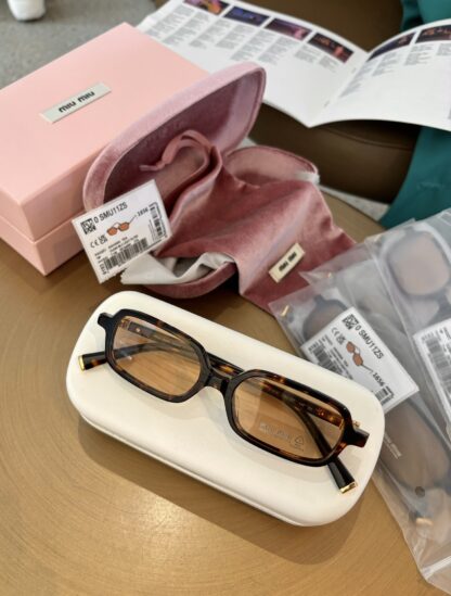 Miu Miu trendy fashion sunglasses