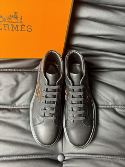 Hermès black and orange color matching cowhide high-end noble high-top casual shoes
