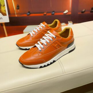 Hermès France Paris catwalk model orange shiny classic casual shoes