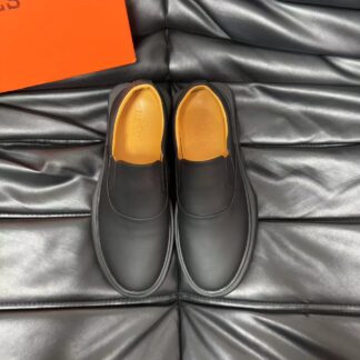 Hermès black leather luxury loafers