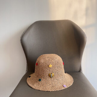 Yves Saint Laurent's new spring and summer polka dot playful woven fisherman hat