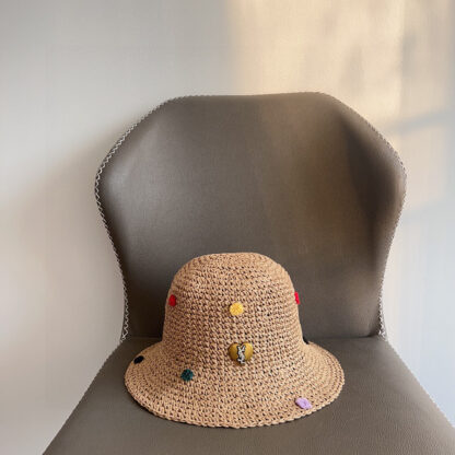 Yves Saint Laurent's new spring and summer polka dot playful woven fisherman hat