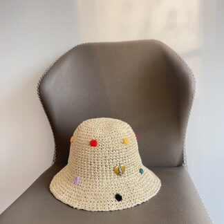 Yves Saint Laurent's new spring and summer polka dot playful woven fisherman hat