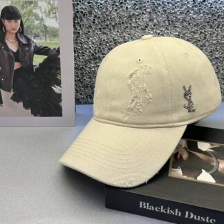 Yves Saint Laurent ripped washed cotton baseball cap