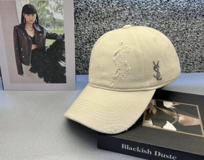 Yves Saint Laurent ripped washed cotton baseball cap