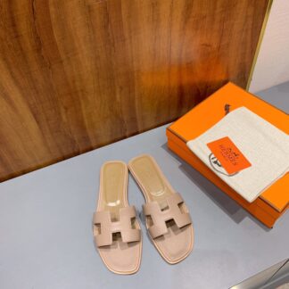 Hermès pink apricot classic lychee leather handmade flat slippers