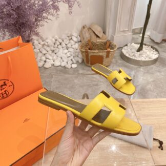 Hermès summer classic yellow palm print flat slippers