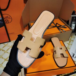 Hermès apricot handmade slippers