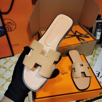 Hermès apricot handmade slippers