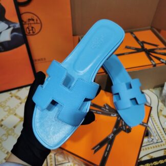 Hermès glazed blue handmade slippers