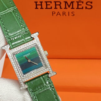 Hermes mother-of-pearl dial and diamond-set quartz watch