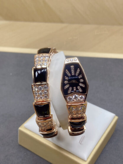 Bulgari rose gold two-circle snake watch